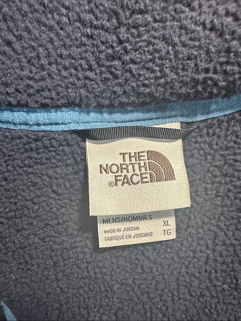 The North Face Navy Fleece Vest with Teal Trim